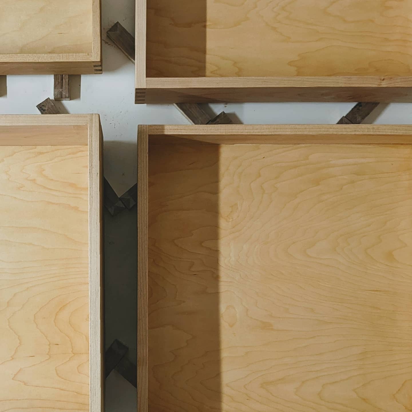 October 27th, 2020: Today, we took the completed dovetailed drawer boxes and finished them with shellac. Two more coats and they'll be ready for delivery!
